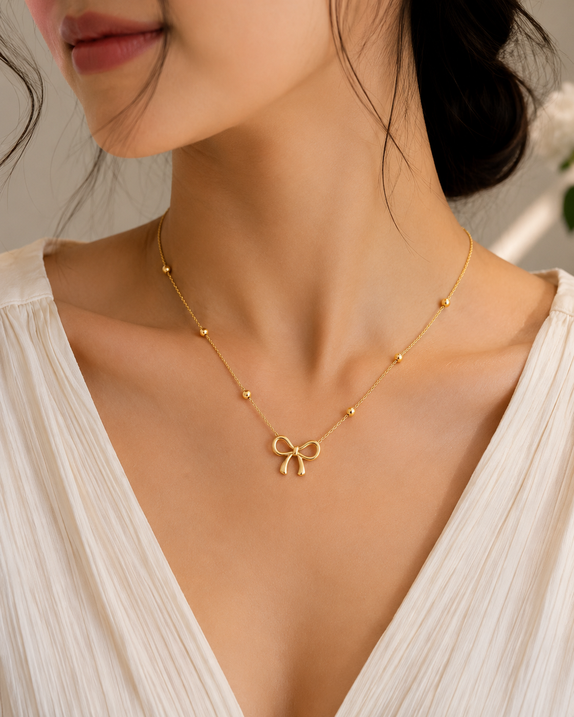 Gold Bow Pendant Necklace